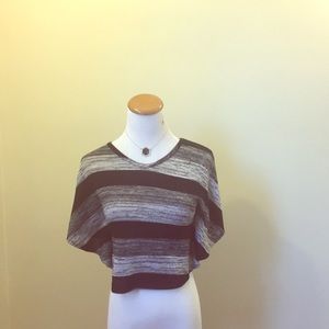 A black,grey and white tee-shirt